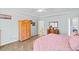 Angle view of a well-lit and spacious bedroom with wood flooring at 6350 Bridge Brook Ovlk, Cumming, GA 30028