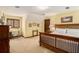 Comfortable bedroom featuring warm walls, ample natural light, and stylish decor at 6575 Roundhill Ct, Cumming, GA 30040