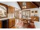 Cozy dining area with natural light, wood ceiling and access to the deck at 6575 Roundhill Ct, Cumming, GA 30040