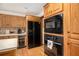 Bright kitchen featuring modern appliances, plenty of cabinet space and an eat-in area at 6575 Roundhill Ct, Cumming, GA 30040