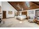 Spacious main bedroom featuring wood-paneled vaulted ceiling and ample natural light at 6575 Roundhill Ct, Cumming, GA 30040
