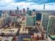 An aerial shot of the city showing the building location and cityscape at 855 Peachtree Ne St # 1911, Atlanta, GA 30308