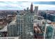 Apartment building featuring the city skyline in the background at 855 Peachtree Ne St # 1911, Atlanta, GA 30308