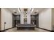 A modern, well-lit lobby with stone and marble features and concierge desk at the building at 855 Peachtree Ne St # 1911, Atlanta, GA 30308