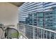Private balcony overlooking the building next door with seating for two and city views at 923 Peachtree Ne St # 1527, Atlanta, GA 30309