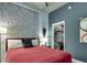 Spacious bedroom featuring a walk-in closet, ceiling fan, and hardwood floors at 923 Peachtree Ne St # 1527, Atlanta, GA 30309