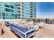 Rooftop deck with outdoor lounge seating, bar and firepit at 923 Peachtree Ne St # 1527, Atlanta, GA 30309