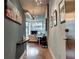 Hallway with hardwood floors that leads to an open-concept living space at 923 Peachtree Ne St # 1527, Atlanta, GA 30309