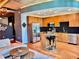 Modern kitchen featuring wood cabinetry, stainless steel appliances, and granite countertops at 923 Peachtree Ne St # 1527, Atlanta, GA 30309