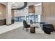 Open concept lobby features a sitting area, modern decor, and upscale finishes at 923 Peachtree Ne St # 1527, Atlanta, GA 30309