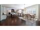 Spacious kitchen with island, modern lighting, and breakfast area at 200 Rivermere Way, Sandy Springs, GA 30350