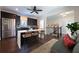 Stylish kitchen with stainless steel appliances, a center island with seating, and hardwood floors at 200 Rivermere Way, Sandy Springs, GA 30350