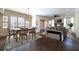 Open-concept with hardwood floors, dining, and living areas, perfect for entertaining and Gathering living at 200 Rivermere Way, Sandy Springs, GA 30350