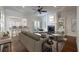 Bright living room boasting a fireplace, built-ins, and French doors leading to the backyard at 200 Rivermere Way, Sandy Springs, GA 30350
