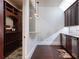 Wet bar area features cabinets, sink, wine storage and bar-height counter for entertainment and spirits at 200 Rivermere Way, Sandy Springs, GA 30350