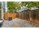 Private fenced backyard with gravel and an air conditioning unit at 241 Maynard Se Ter # 17, Atlanta, GA 30316