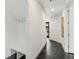 Bright hallway features custom storage with bench and coat hooks and a concrete floor at 241 Maynard Se Ter # 17, Atlanta, GA 30316