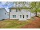 Home exterior with grassy backyard and small patio at 2949 Jefferson St, Austell, GA 30106