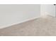 Spacious bedroom featuring neutral carpet and a white wall, creating a bright and inviting atmosphere at 2949 Jefferson St, Austell, GA 30106
