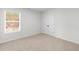 Bright bedroom with natural light and white double doors, perfect for a comfortable living space at 2949 Jefferson St, Austell, GA 30106