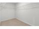 Empty closet with wire shelving and neutral carpet, offering a blank canvas for storage at 2949 Jefferson St, Austell, GA 30106