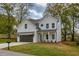 Charming two-story home with a well-manicured lawn and a two-car garage at 2949 Jefferson St, Austell, GA 30106