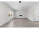 Bright living room featuring wood-look flooring, a fireplace, and a ceiling fan at 2949 Jefferson St, Austell, GA 30106