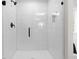 Modern bathroom with a glass shower and tiled walls, providing a clean and contemporary feel at 2949 Jefferson St, Austell, GA 30106