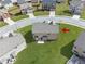 Aerial view of the rear exterior of a home with green space and suburban neighborhood setting at 3243 Shoals Park Dr, Decatur, GA 30034