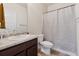 This bathroom offers tile floors, a shower-tub combo, and a large vanity at 3243 Shoals Park Dr, Decatur, GA 30034