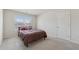 This bedroom offers large window, neutral carpeting and a cozy layout at 3243 Shoals Park Dr, Decatur, GA 30034