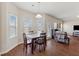 Open dining area featuring large bay windows providing ample natural light and backyard views at 3243 Shoals Park Dr, Decatur, GA 30034