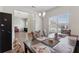 Open dining room with views of the front yard, comfortably seating six at 3243 Shoals Park Dr, Decatur, GA 30034
