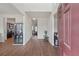 Inviting foyer with hardwood floors, leading to the kitchen and living areas at 3243 Shoals Park Dr, Decatur, GA 30034