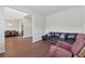 Spacious living room with hardwood floors, adjacent to the dining area at 3243 Shoals Park Dr, Decatur, GA 30034