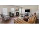 Comfortable living room featuring a cozy fireplace and a plush leather couch at 3243 Shoals Park Dr, Decatur, GA 30034