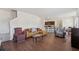 Open concept living space with hardwood floors, living room, kitchen and dining areas at 3243 Shoals Park Dr, Decatur, GA 30034