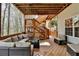 Outdoor deck with patio furniture and wood beams at 525 Water Shadow Ln, Alpharetta, GA 30022