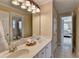Bathroom with dual sinks, white cabinets, and tile floors at 525 Water Shadow Ln, Alpharetta, GA 30022
