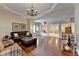 Open living room featuring hardwood floors and natural light at 525 Water Shadow Ln, Alpharetta, GA 30022
