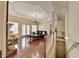 Bright living room with hardwood floors, a fireplace, and French doors leading to the outside at 525 Water Shadow Ln, Alpharetta, GA 30022