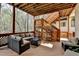Covered outdoor patio with comfortable seating, perfect for relaxing and enjoying the view at 525 Water Shadow Ln, Alpharetta, GA 30022