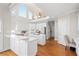 Modern kitchen with stainless steel appliances, an island cooktop, and hardwood floors, perfect for entertaining at 760 Valley Summit Drive, Roswell, GA 30075