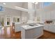 Spacious kitchen with an island cooktop, modern appliances, hardwood floors and lots of natural light at 760 Valley Summit Drive, Roswell, GA 30075