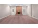 Living room featuring a red brick fireplace and mauve carpet at 760 Valley Summit Drive, Roswell, GA 30075