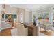 Inviting home office featuring hardwood floors, large windows, and comfortable seating area, perfect for work at 760 Valley Summit Drive, Roswell, GA 30075