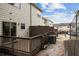 Cozy back decks on each unit in a row of townhomes, each with a privacy divider and sliding glass door at 1536 Liberty Nw Pkwy, Atlanta, GA 30318