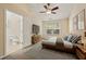 Bedroom with modern fixtures, carpet, en-suite bathroom, television and natural light at 1536 Liberty Nw Pkwy, Atlanta, GA 30318