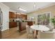 Bright kitchen features wood cabinetry, stainless steel appliances, granite countertops, and center island at 1536 Liberty Nw Pkwy, Atlanta, GA 30318