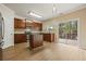 Open kitchen featuring an island, stainless appliances, and sliding door to outdoor deck at 1536 Liberty Nw Pkwy, Atlanta, GA 30318
